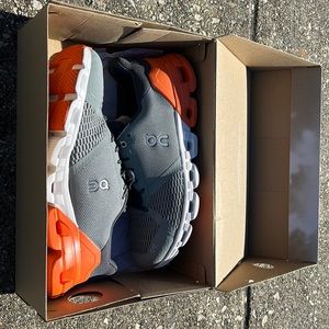 On Clouds, size 11, orange, grey, and white.